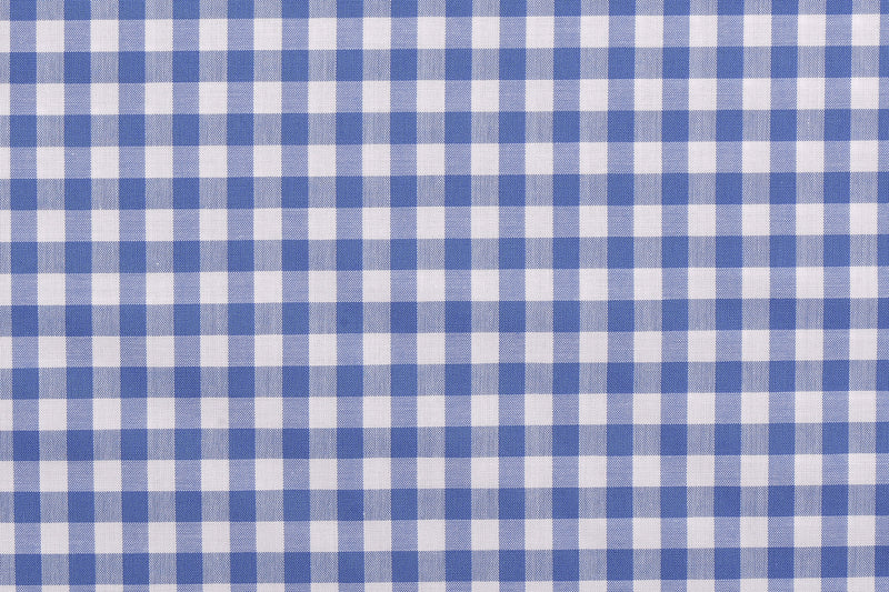 Closeup view of custom check shirts for men by Luxire light blue checks on white