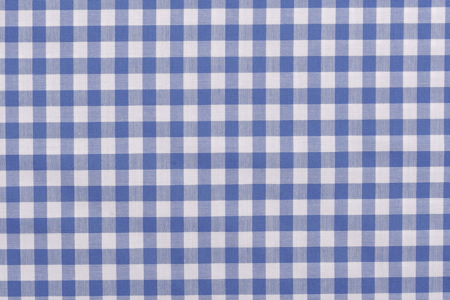 Closeup view of custom check shirts for men by Luxire light blue checks on white