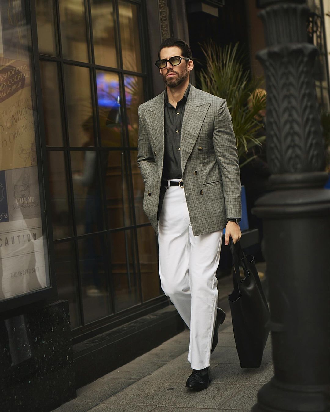 Model outside wearing mens heavy twill jeans by Luxire in white 2