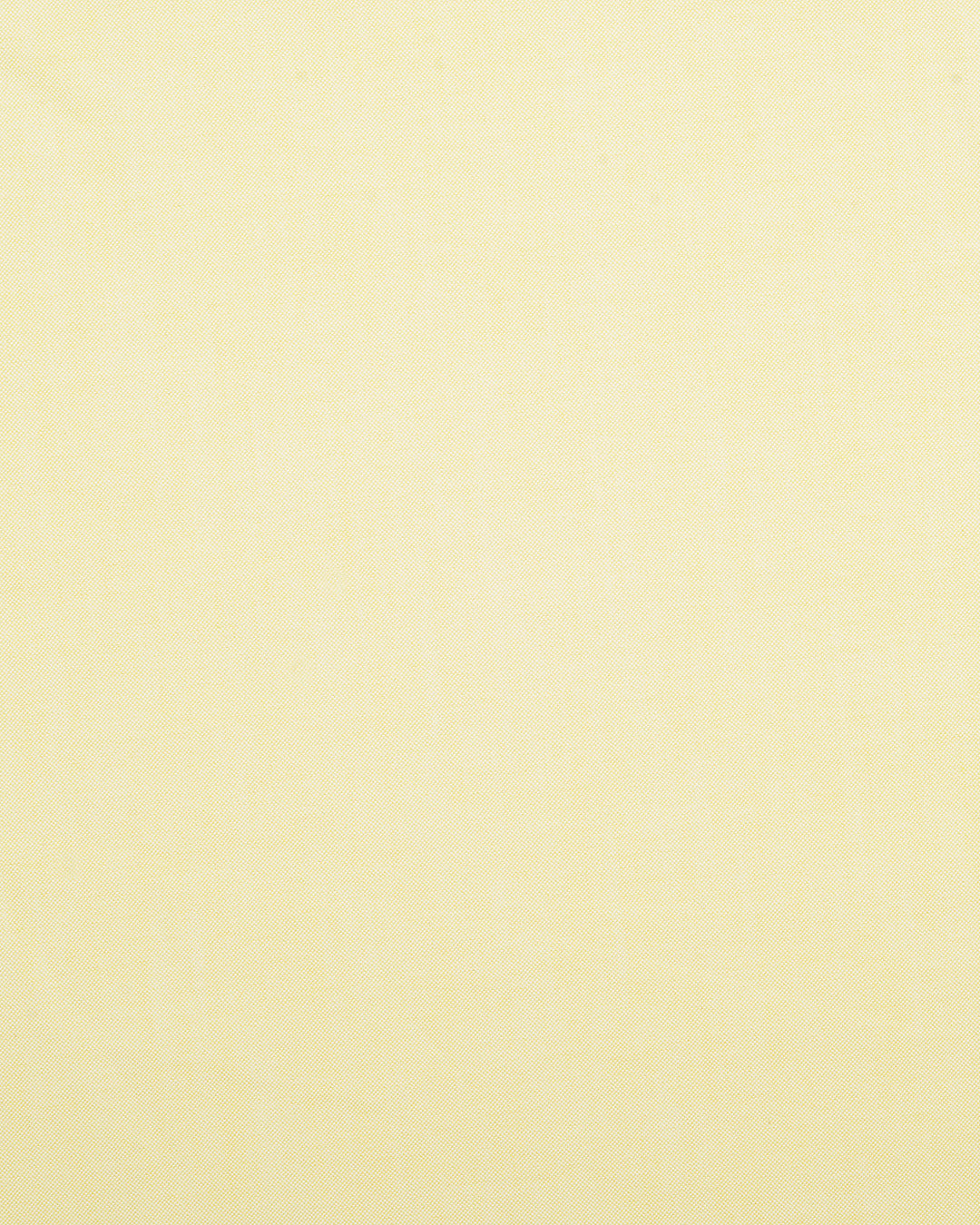 Close up of the custom oxford shirt for men by Luxire in light yellow