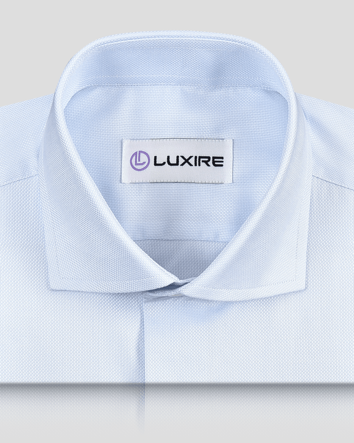 Collar of the custom oxford shirt for men by Luxire in business blue