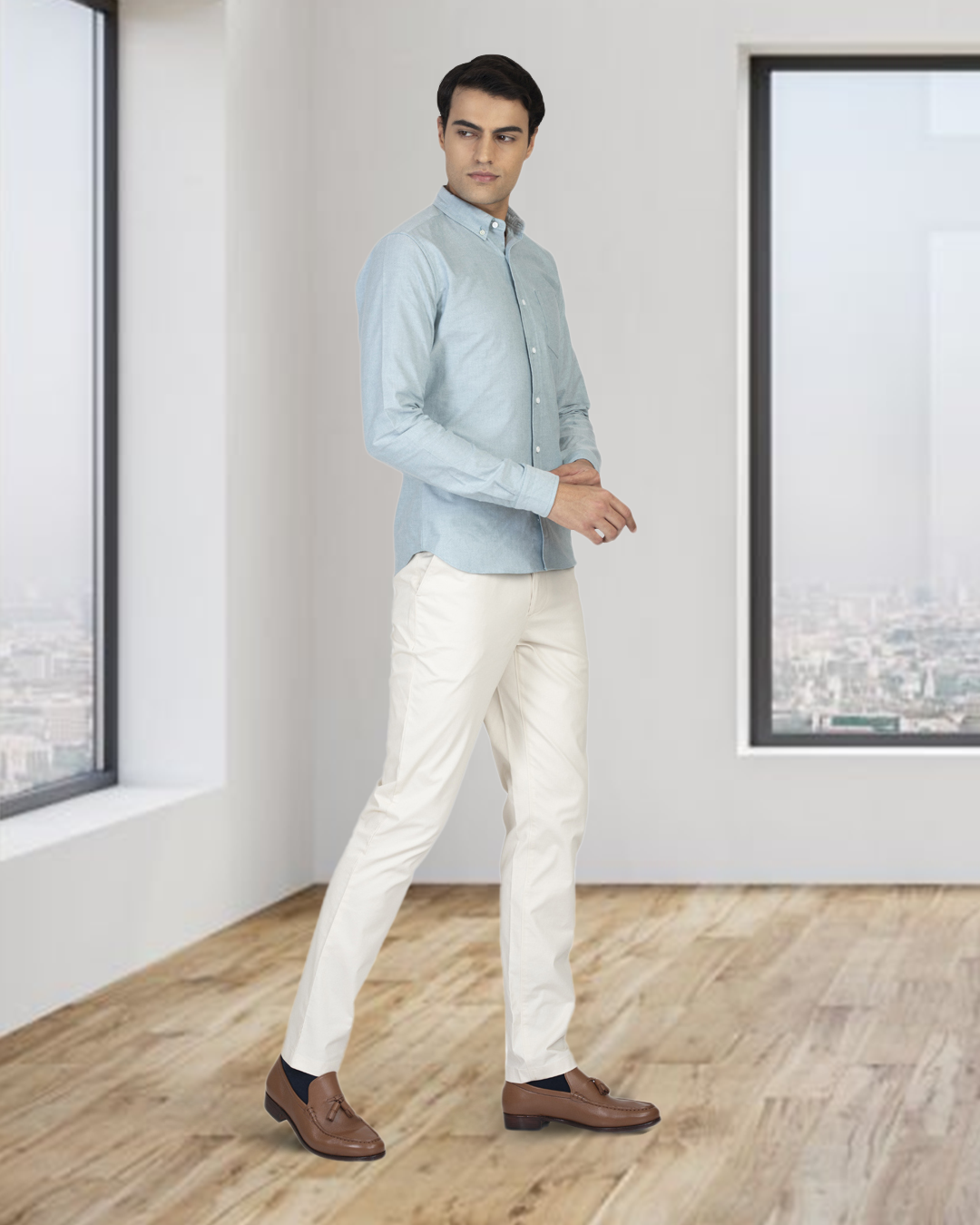 Side of model wearing the custom oxford shirt for men by Luxire in mint green