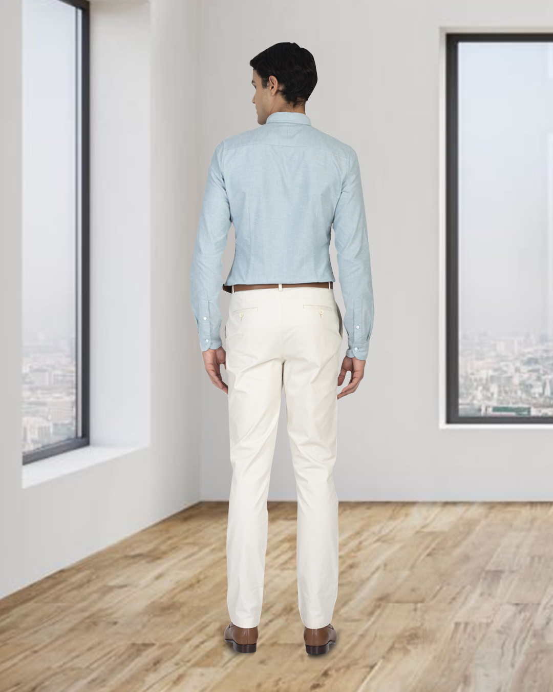 Back of model wearing the custom oxford shirt for men by Luxire in mint green