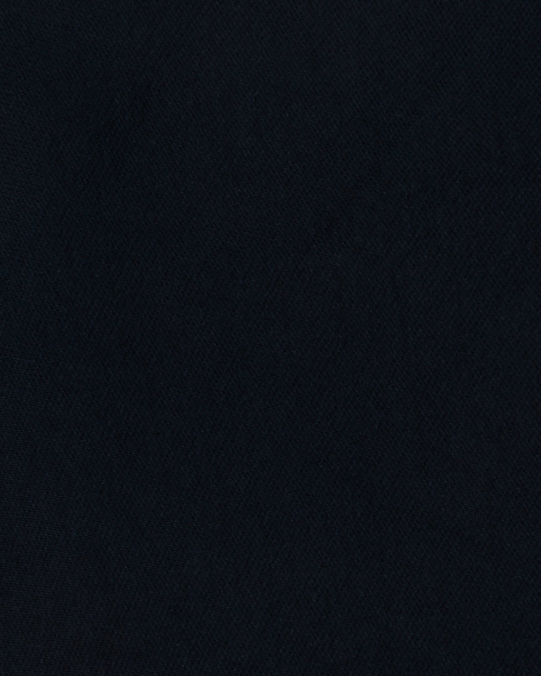 Close up of the custom oxford polo shirt for men by Luxire in dark indigo