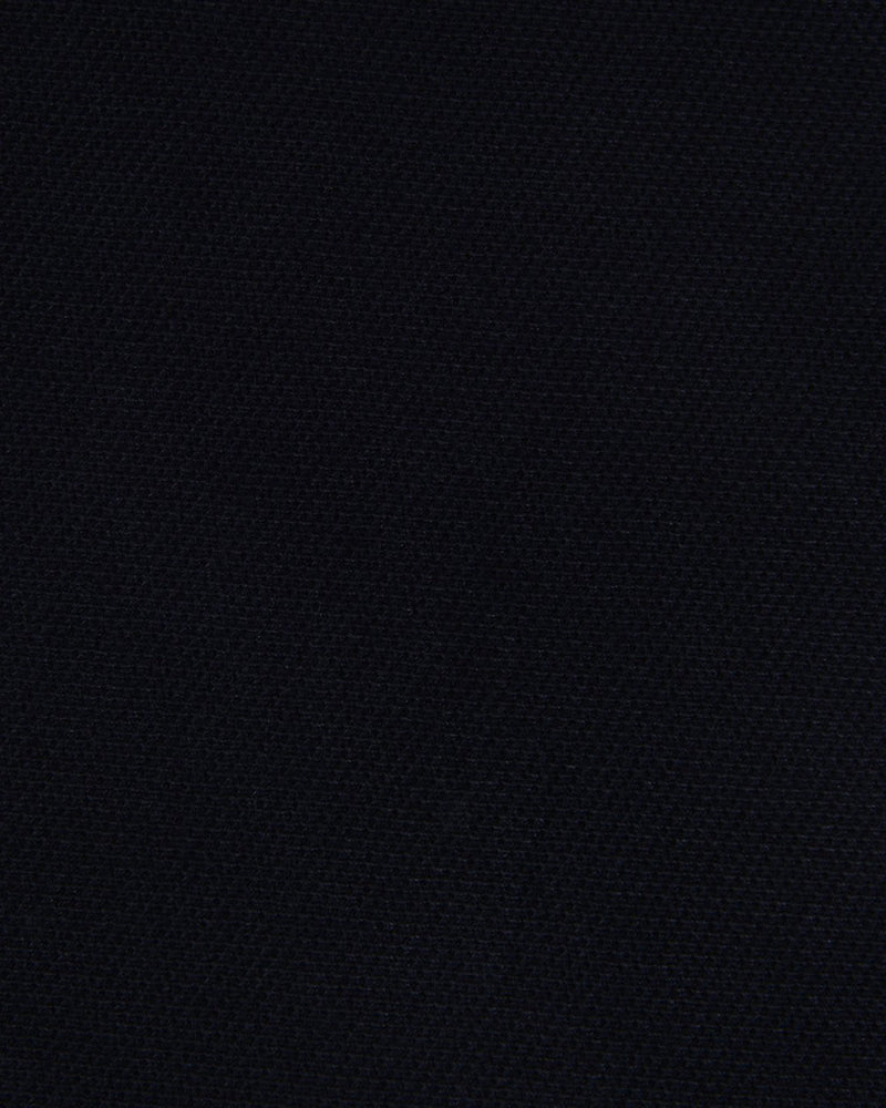 Close up of the custom oxford polo shirt for men by Luxire in midnight navy