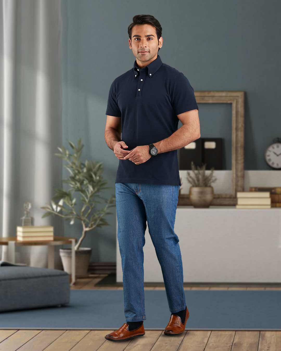 Model wearing the custom oxford polo shirt for men by Luxire in navy hands together