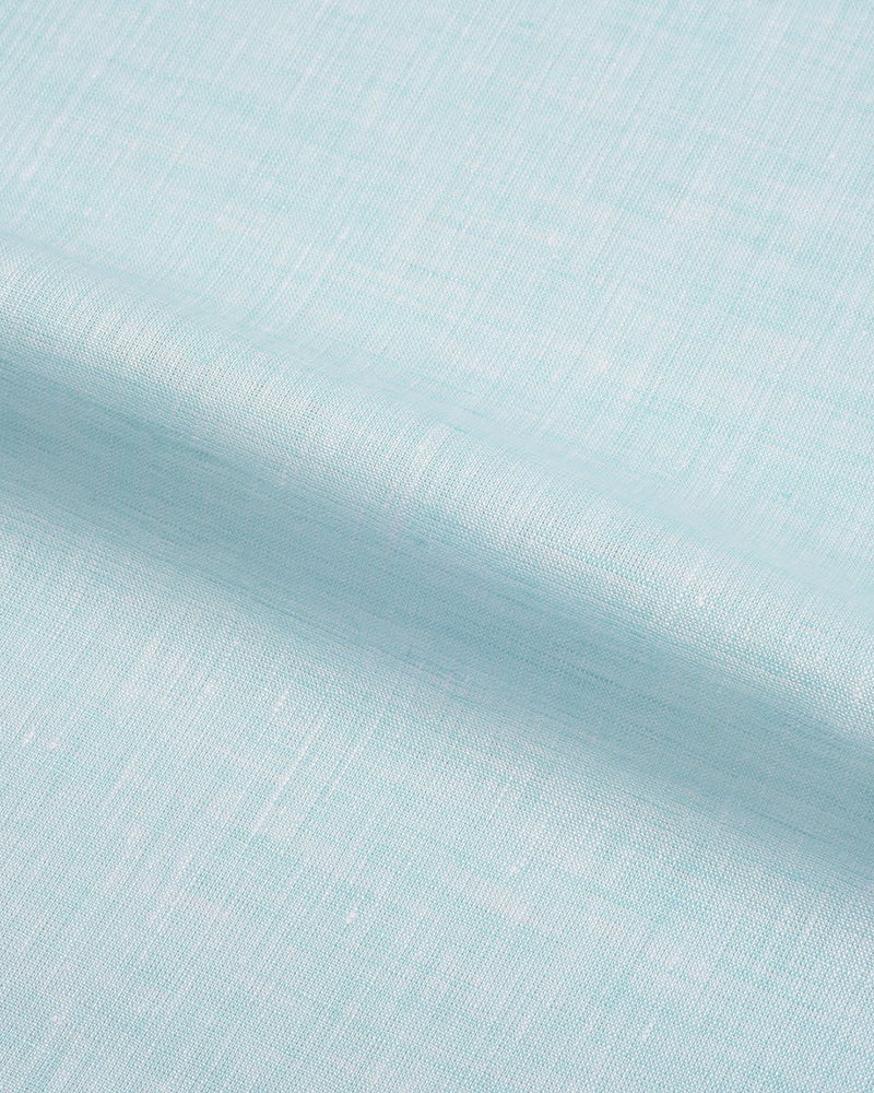 Close up of the custom linen shirt for men in sea green by Luxire Clothing