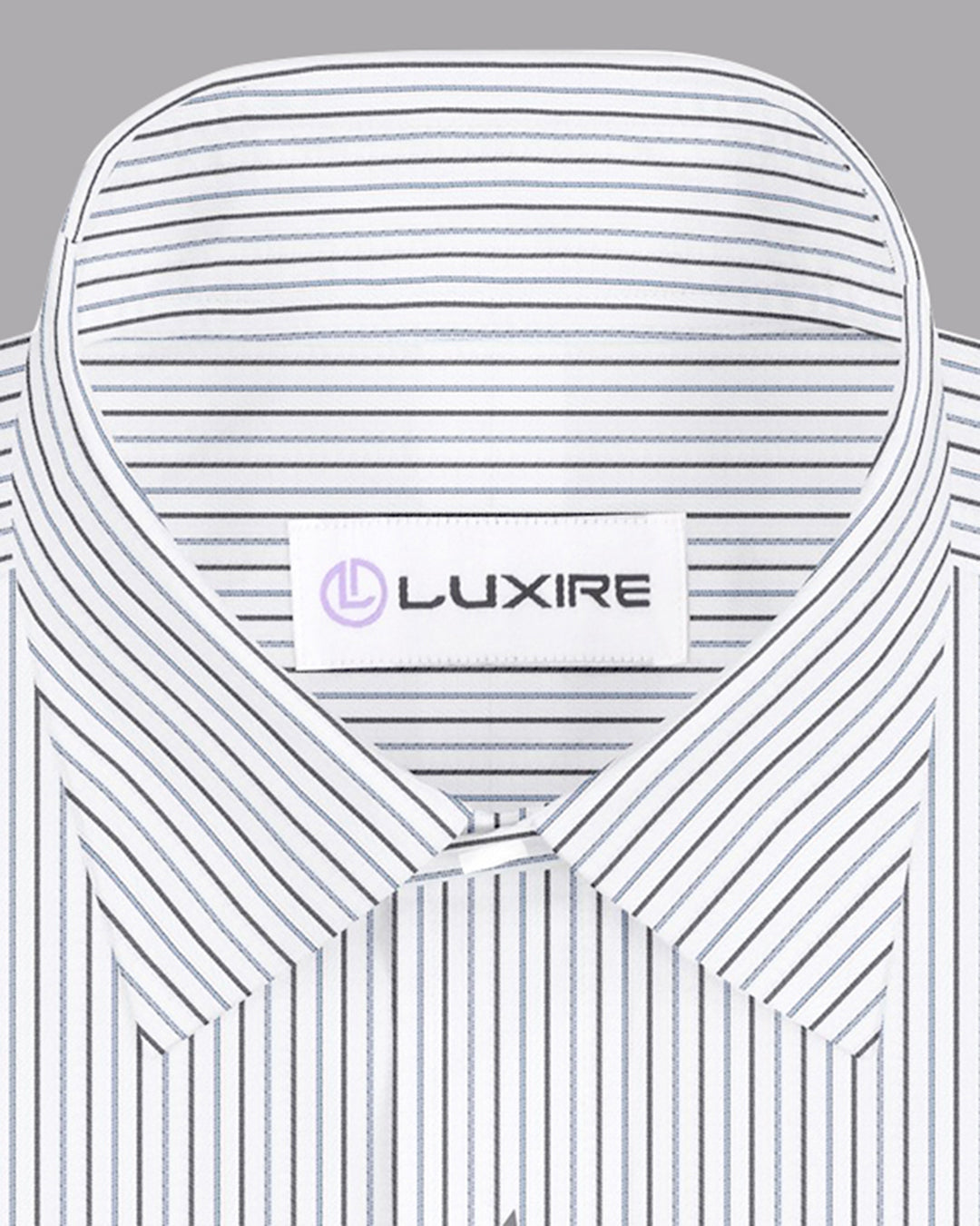 Collar of the custom linen shirt for men in white with black and blue stripes by Luxire Clothing