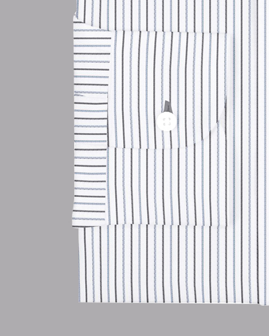 Cuff of the custom linen shirt for men in white with black and blue stripes by Luxire Clothi