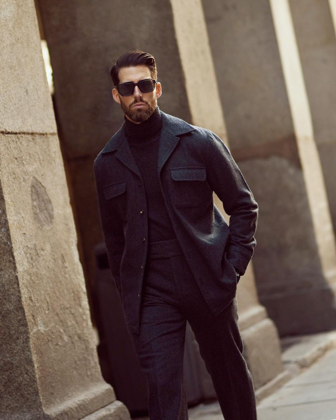 Model wearing the recycled wool shirt jacket for men by Luxire in charcoal grey