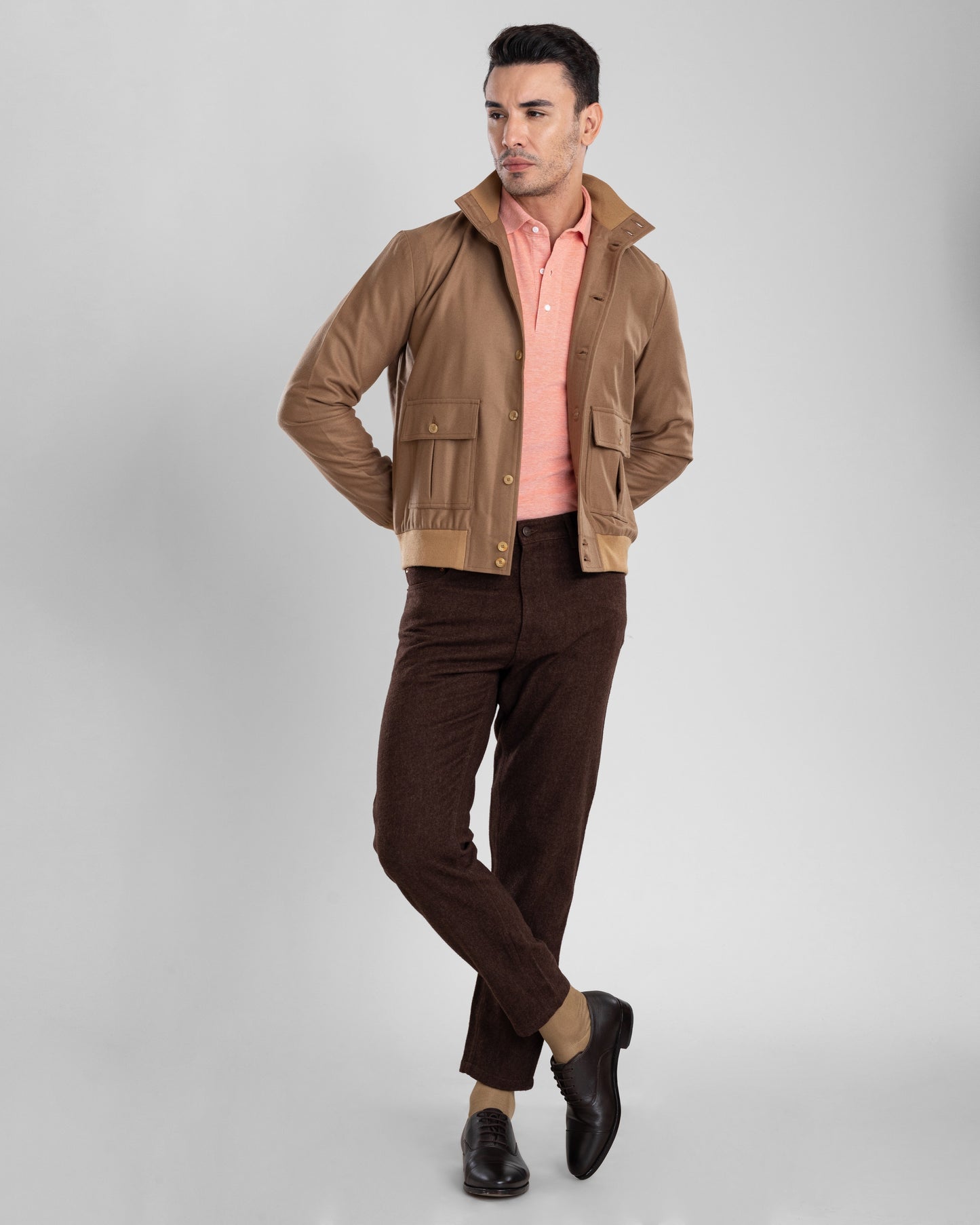 Front of model wearing the flannel shirt jacket for men by Luxire in sand with rib collar