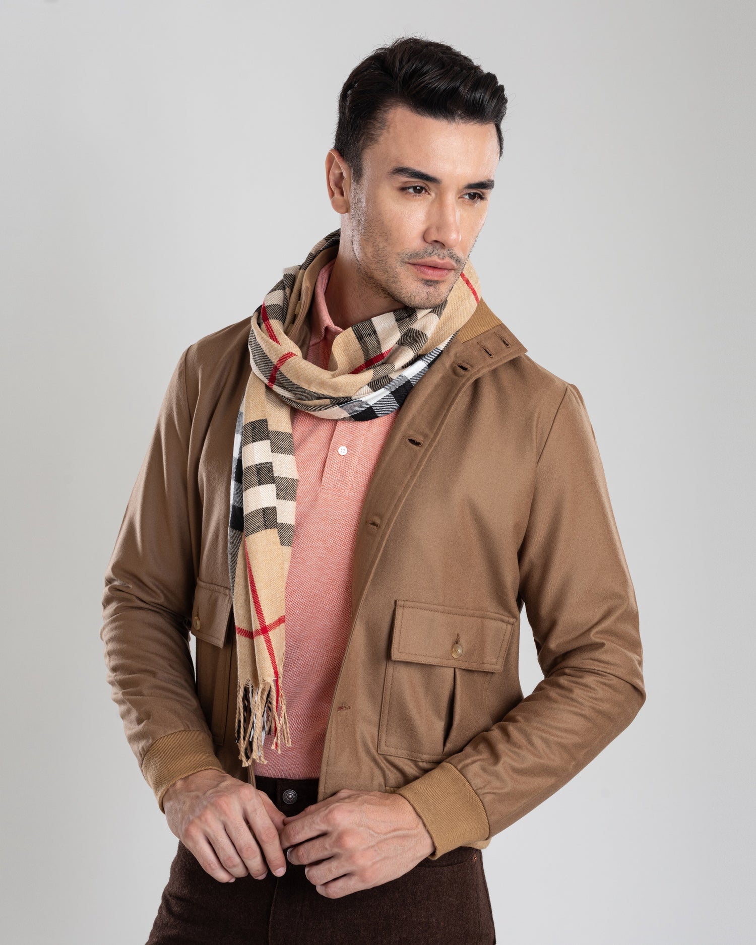 Model wearing the flannel shirt jacket for men by Luxire in sand with rib collar wearing a scarf