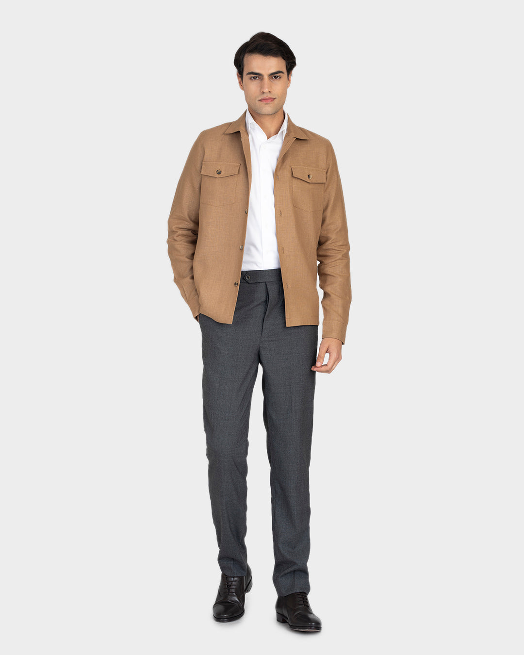 Front of model wearing the linen shirt jacket for men by Luxire in golden brown