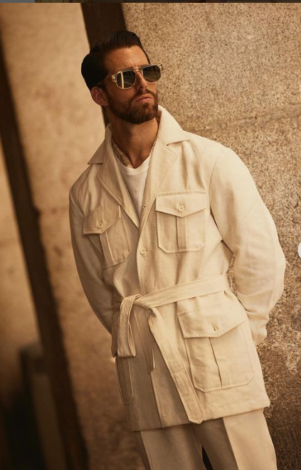 Front of model wearing the safari jacket in linen cotton for men by Luxire in off white 2