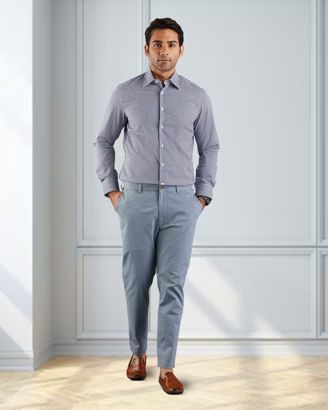 Front view of model  wearing custom Genoa Chino pants for men by Luxire in soft blue grey