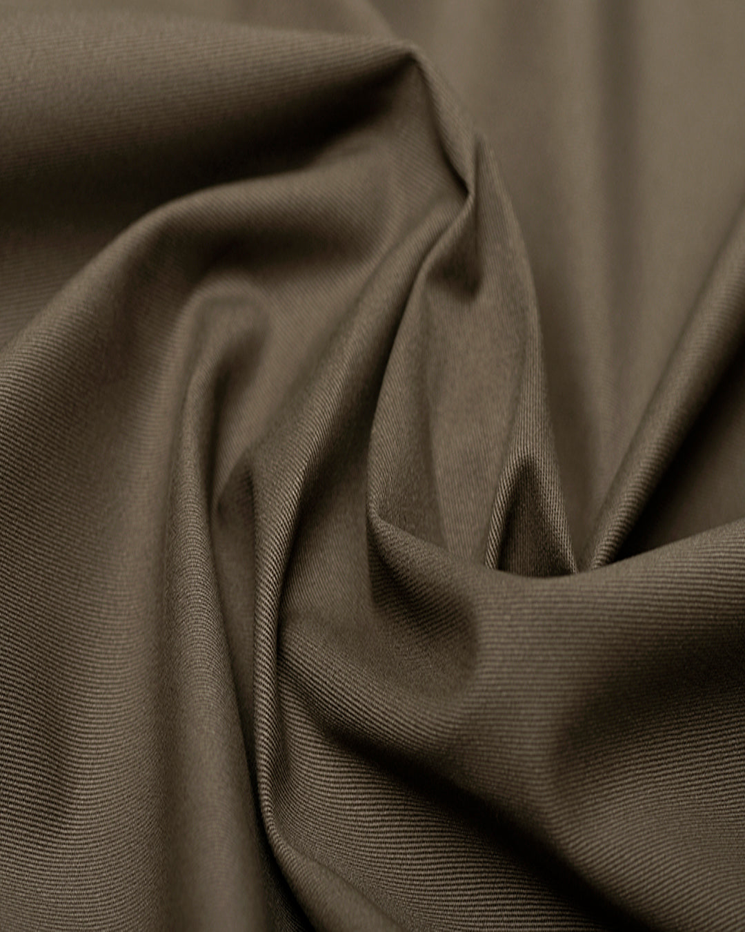 Closeup view of custom Genoa Chino pants for men by Luxire in khaki brown