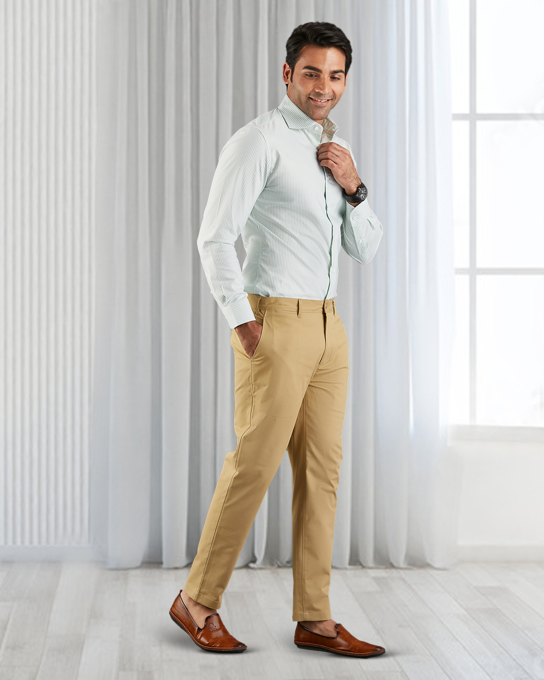 Model wearing custom Genoa Chino pants for men by Luxire in khaki hand in pocket