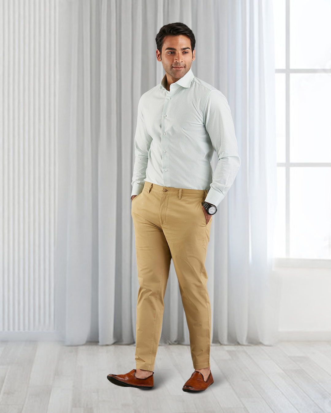 Model wearing custom Genoa Chino pants for men by Luxire in khaki hands in pockets