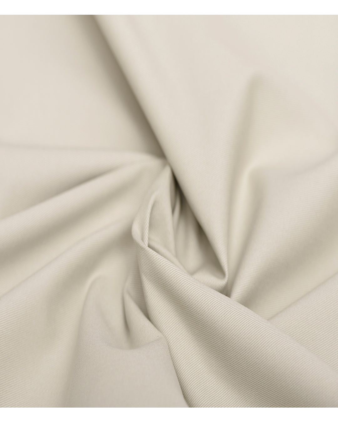 Closeup view of custom Genoa Chino pants for men by Luxire in light beige