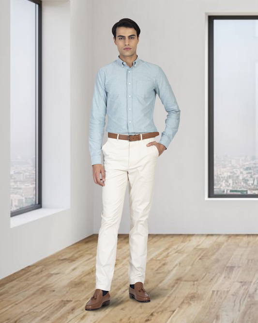 Model wearing custom Genoa Chino pants for men by Luxire in ivory cream