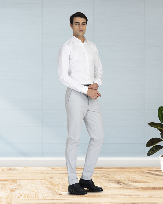 Model wearing custom Genoa Chino pants for men by Luxire in light grey