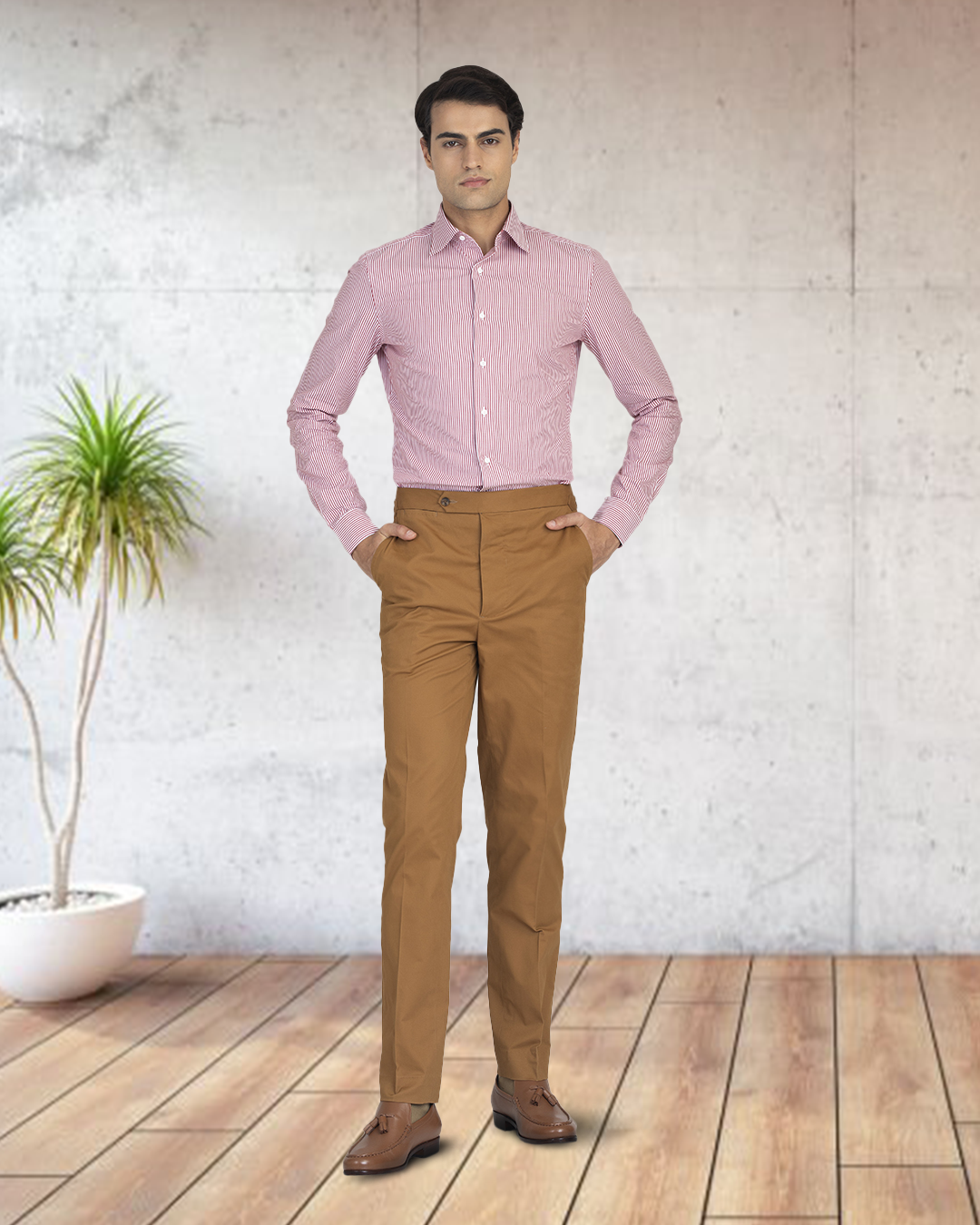 Model wearing custom Genoa Chino pants for men by Luxire in copper hands at side