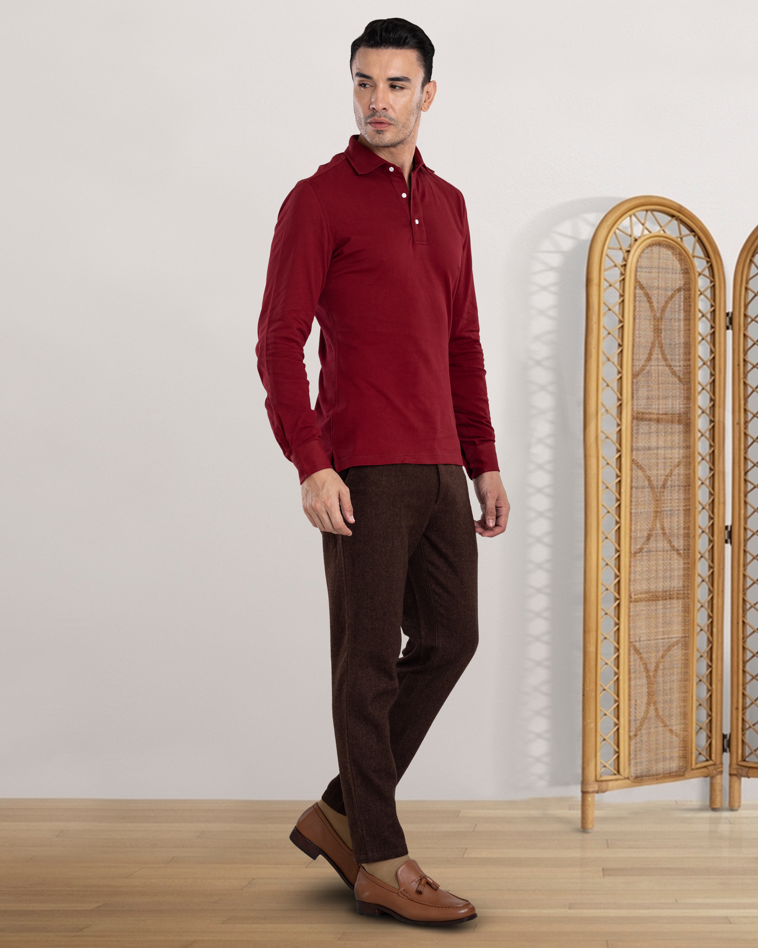 Side view of model wearing custom wool Chino pants for men by Luxire in brown
