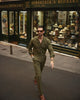 Male model outside wearing custom linen Gurkha pants for men by Luxire in olive