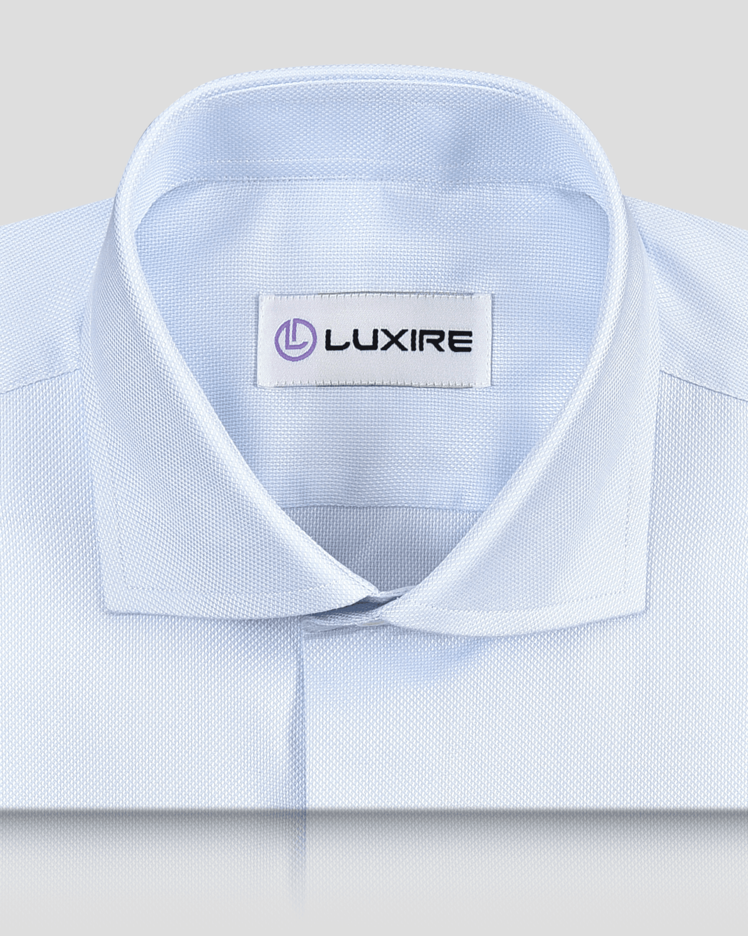 Collar of the custom oxford shirt for men by Luxire in business blue