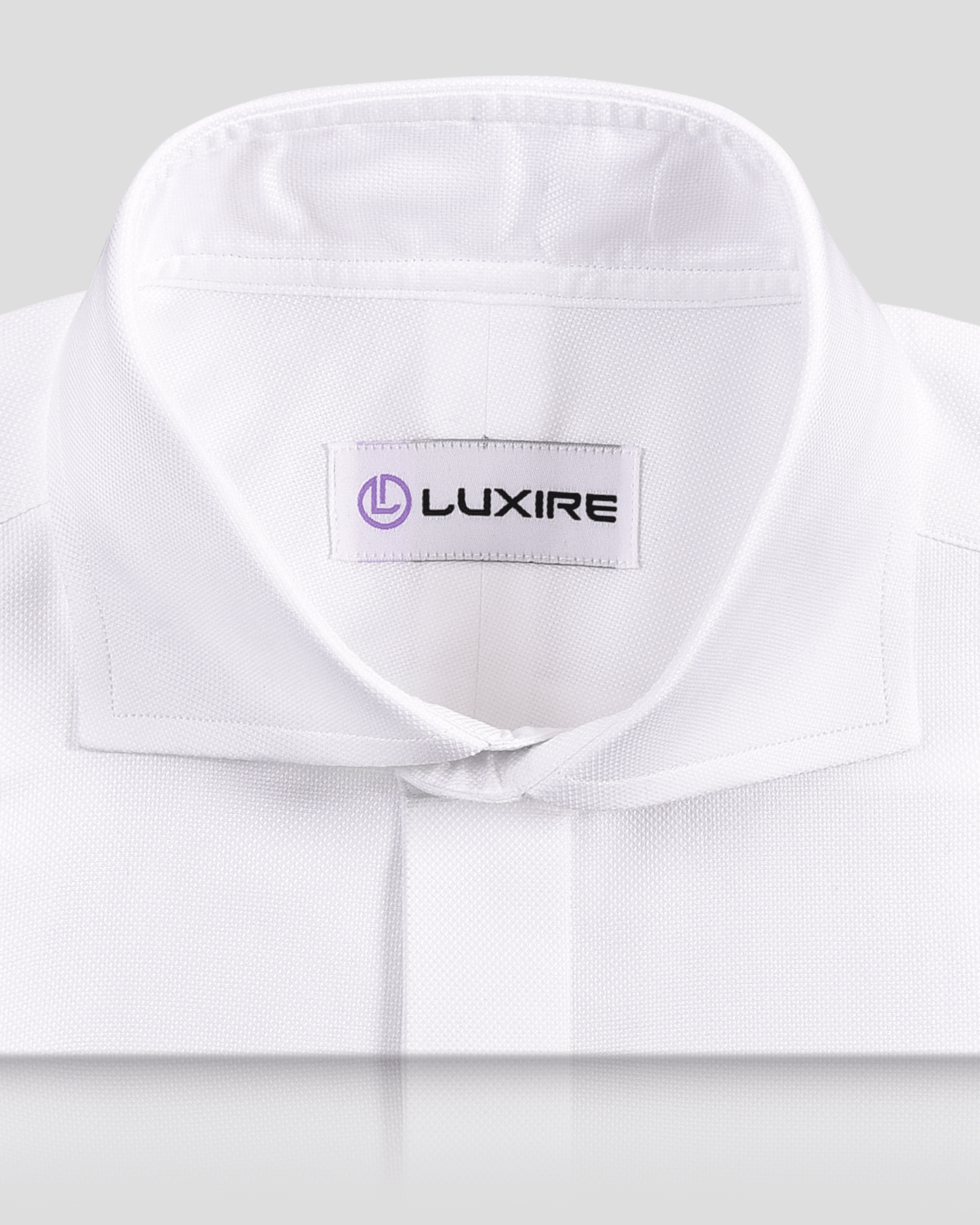 Collar of the custom oxford shirt for men by Luxire in white royal