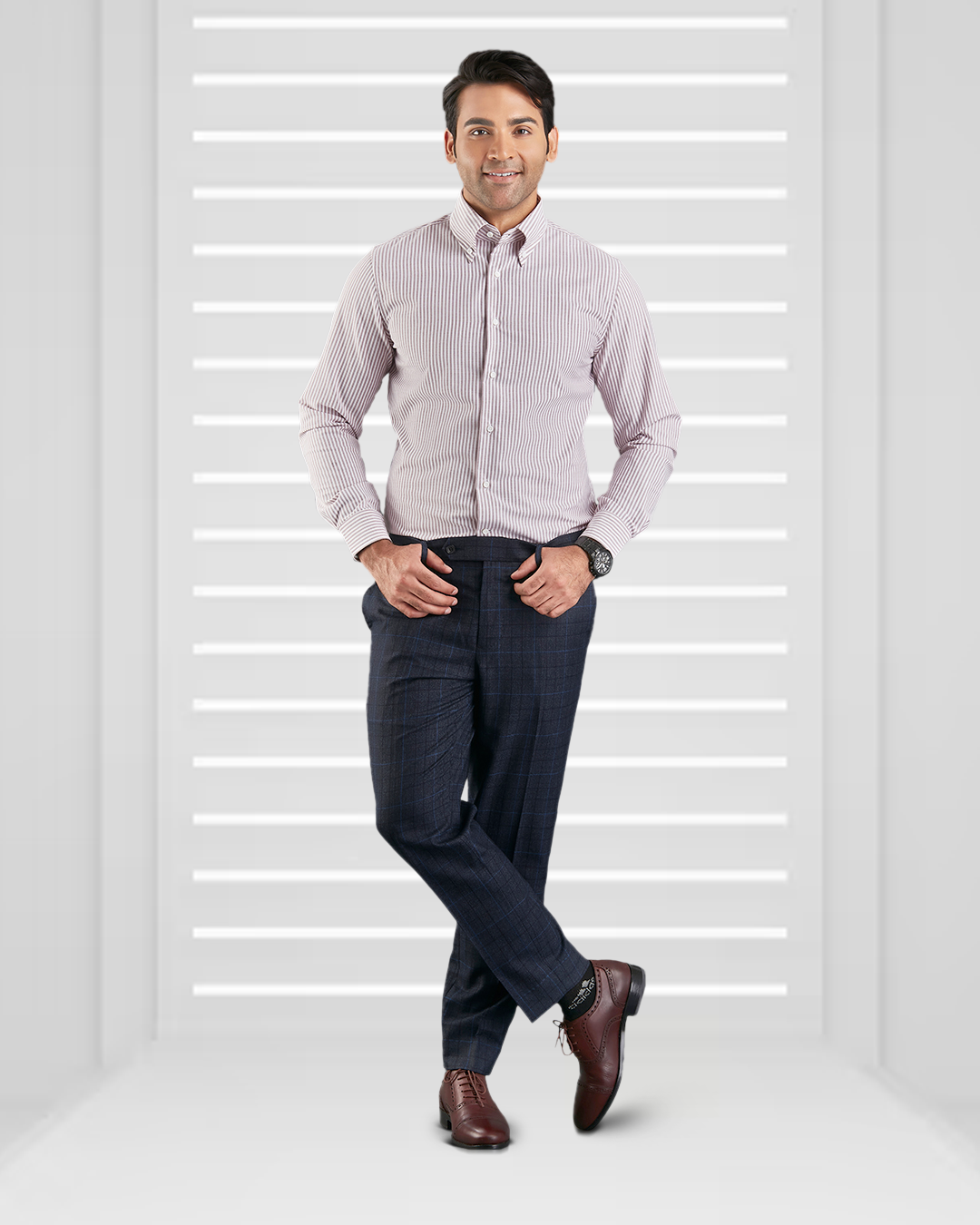 Model wearing the custom oxford shirt for men by Luxire in white with maroon university stripes hands at waist