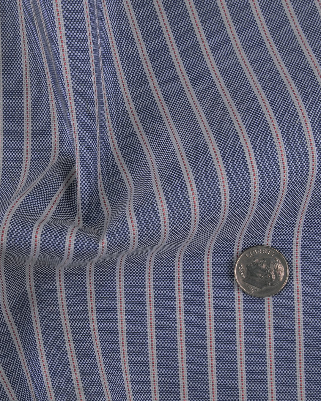 Close up of the custom oxford shirt for men by Luxire in navy awning with red pinstripes 2