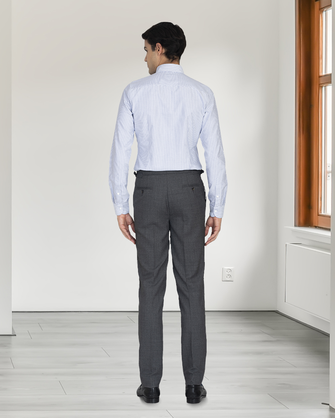 Back of model wearing the custom oxford shirt for men by Luxire in white with navy stripes