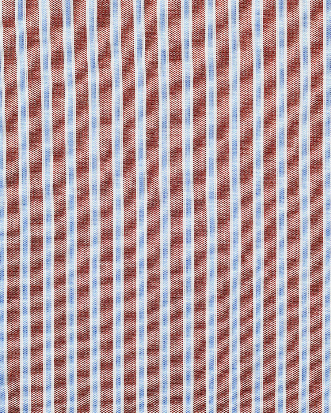 Close up of the custom oxford shirt for men by Luxire with blue white and rust stripes