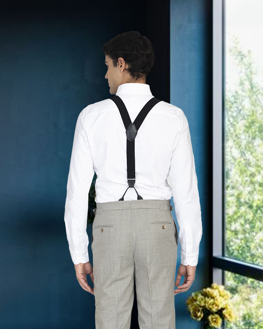 Back of model wearing the custom oxford shirt for men by Luxire in warzone white