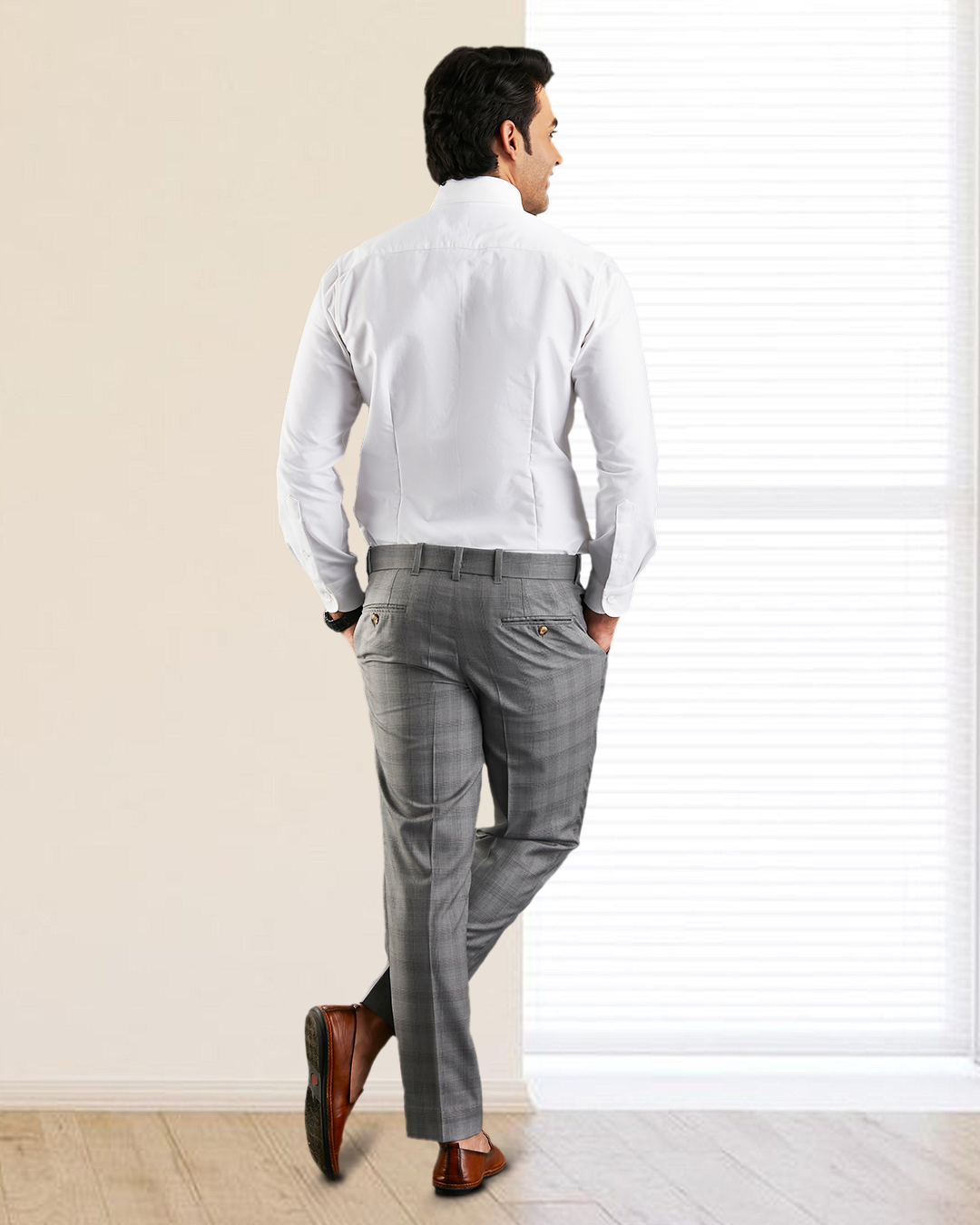 Back of model wearing the custom oxford shirt for men by Luxire in warzone white