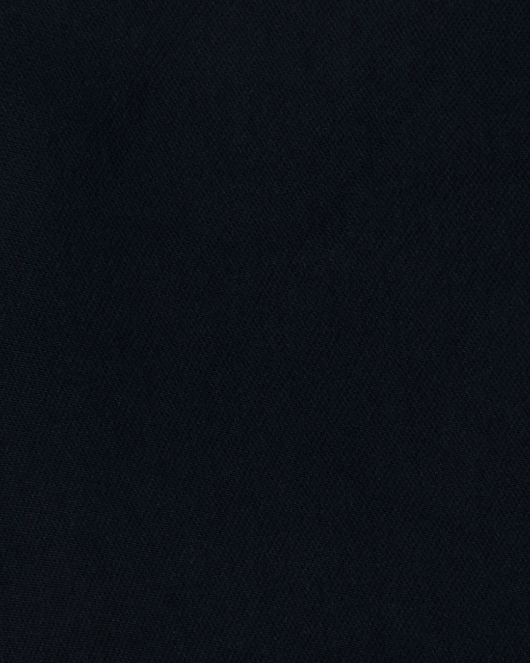 Close up of the custom oxford polo shirt for men by Luxire in dark indigo