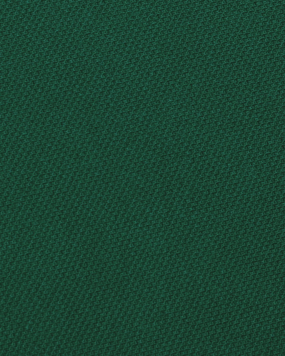 Close up of the custom oxford polo shirt for men by Luxire in racing green