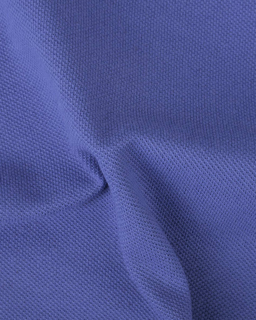 Close up of the custom oxford polo shirt for men by Luxire in lavender