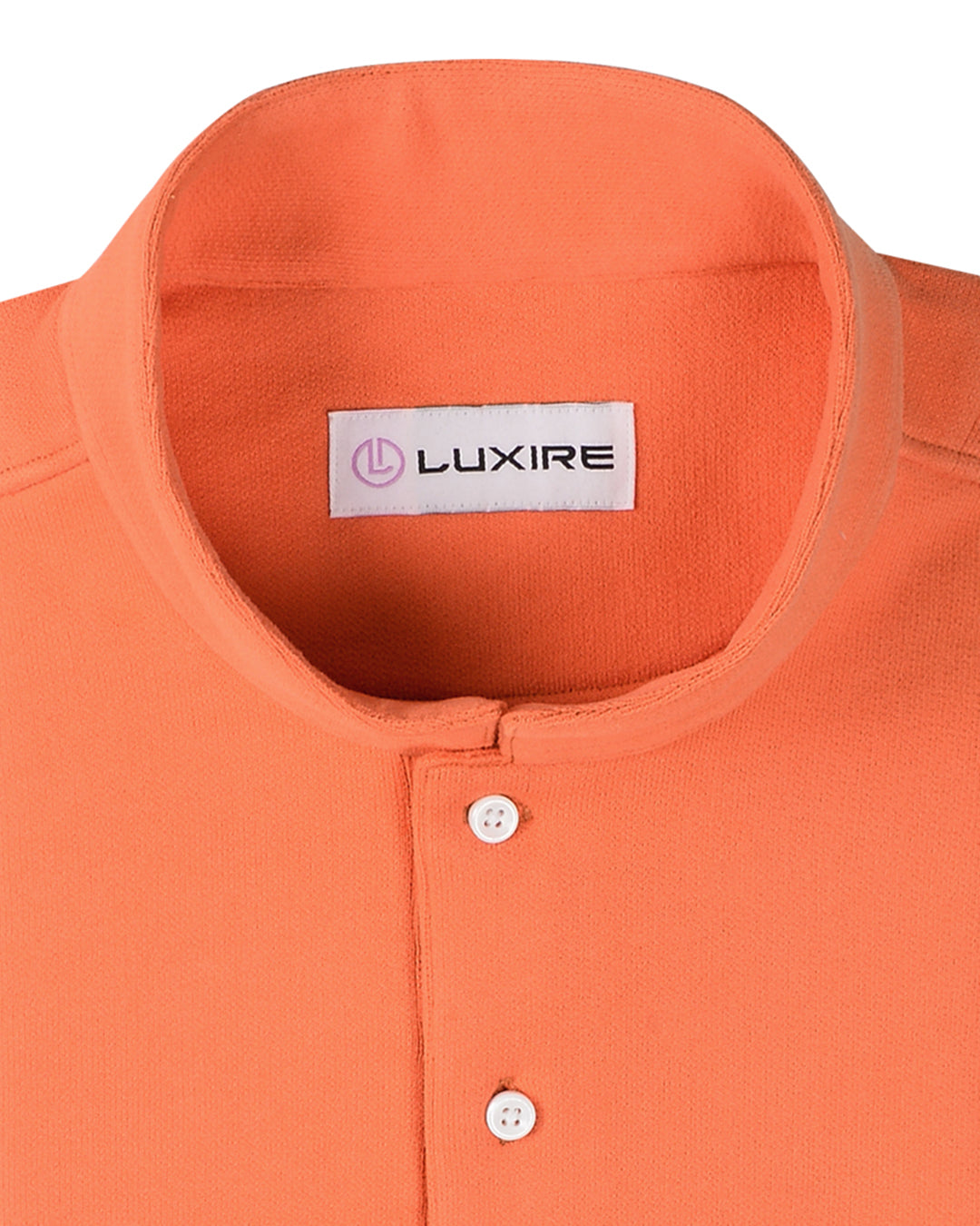 Collar of the custom oxford polo shirt for men by Luxire in bright orange