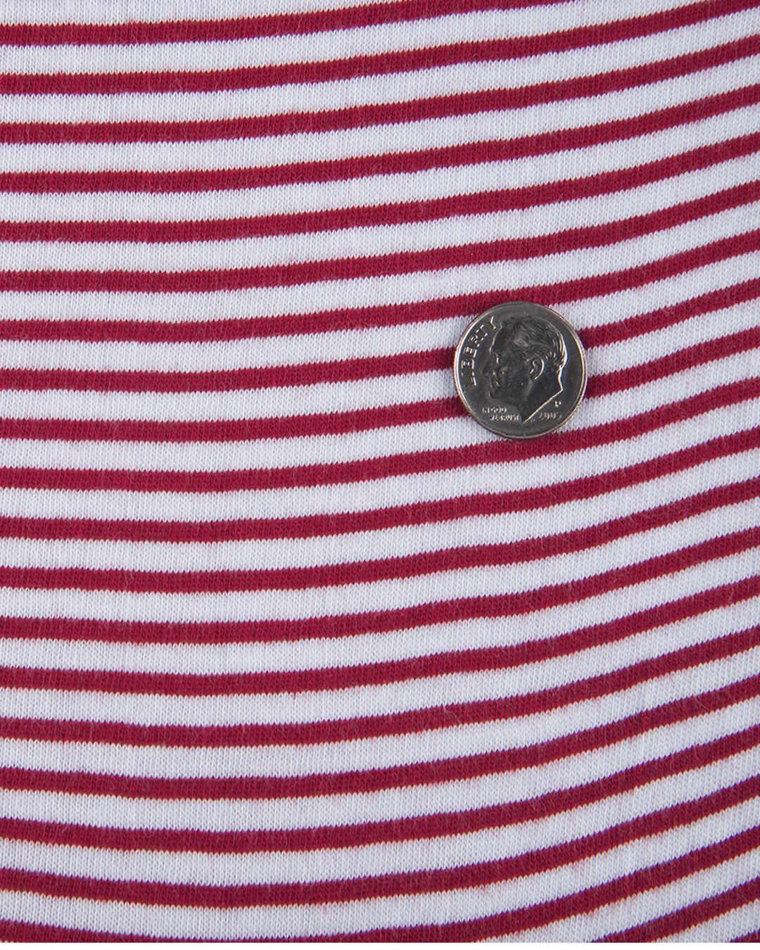 Close up of the custom oxford polo shirt for men by Luxire in white with red candy stripes