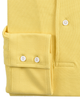 Cuff of the custom oxford polo shirt for men by Luxire in light yellow