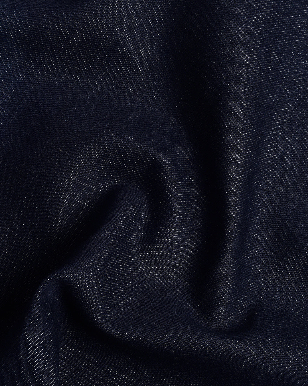 Close up view of custom linen cotton jeans for men by Luxire in indigo 4