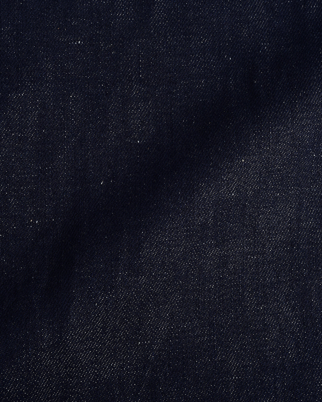 Close up view of custom linen cotton jeans for men by Luxire in indigo 5