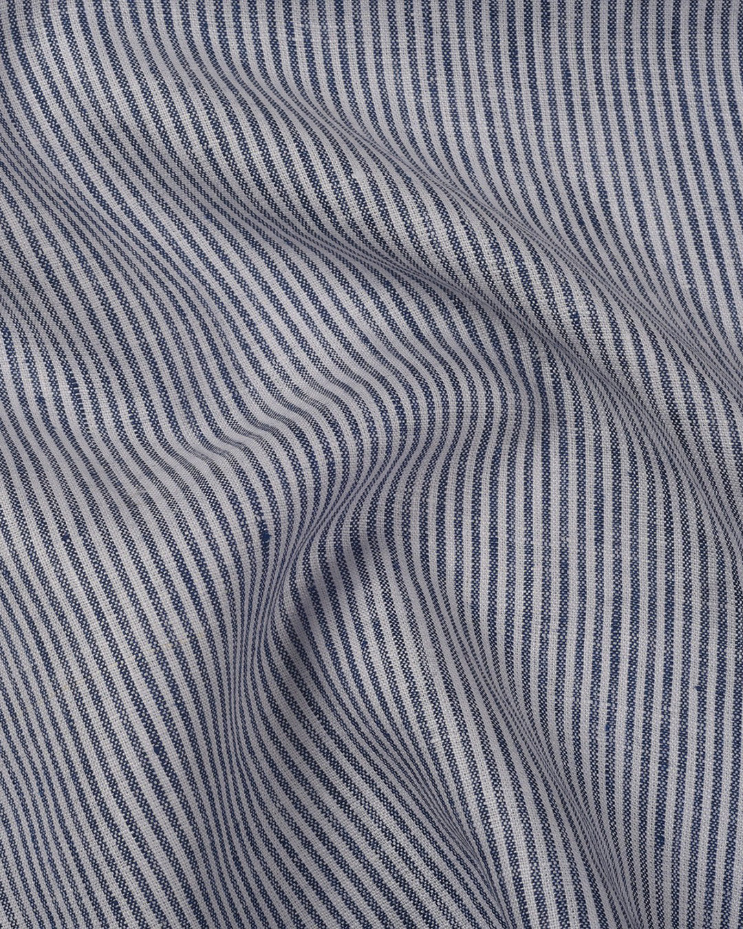 Close up of the custom linen shirt for men in blue and white stripes by Luxire Clothing 2