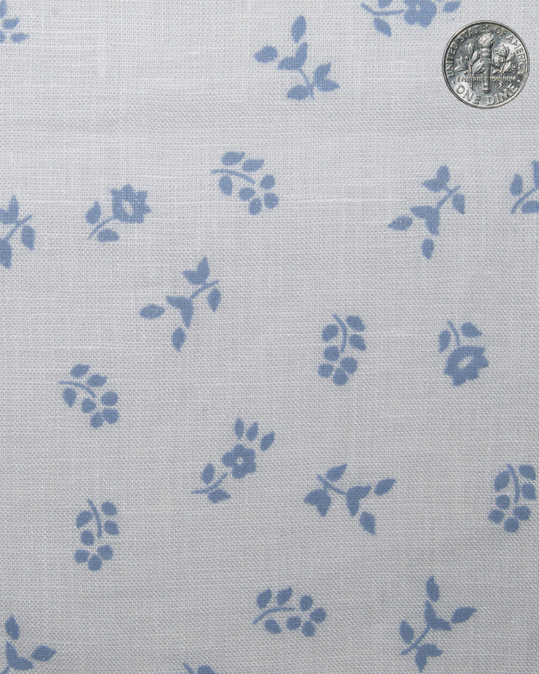 Close up view of custom linen shirt for men in blue printed leaves
