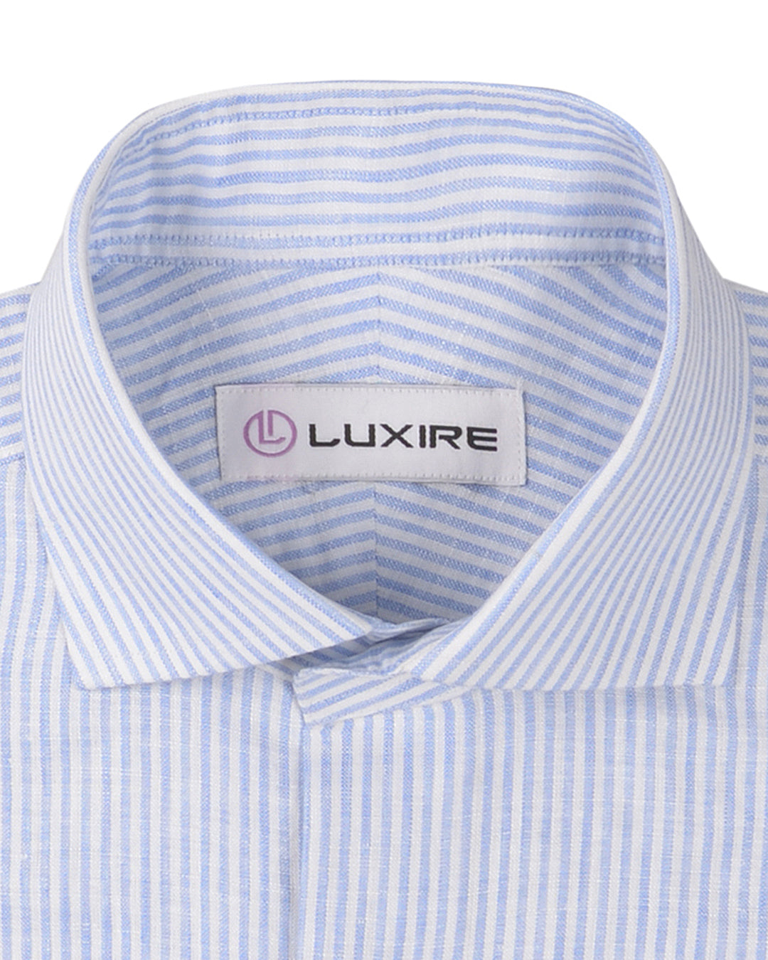 Collar of the custom linen shirt for men in light blue dress stripes by Luxire Clothing