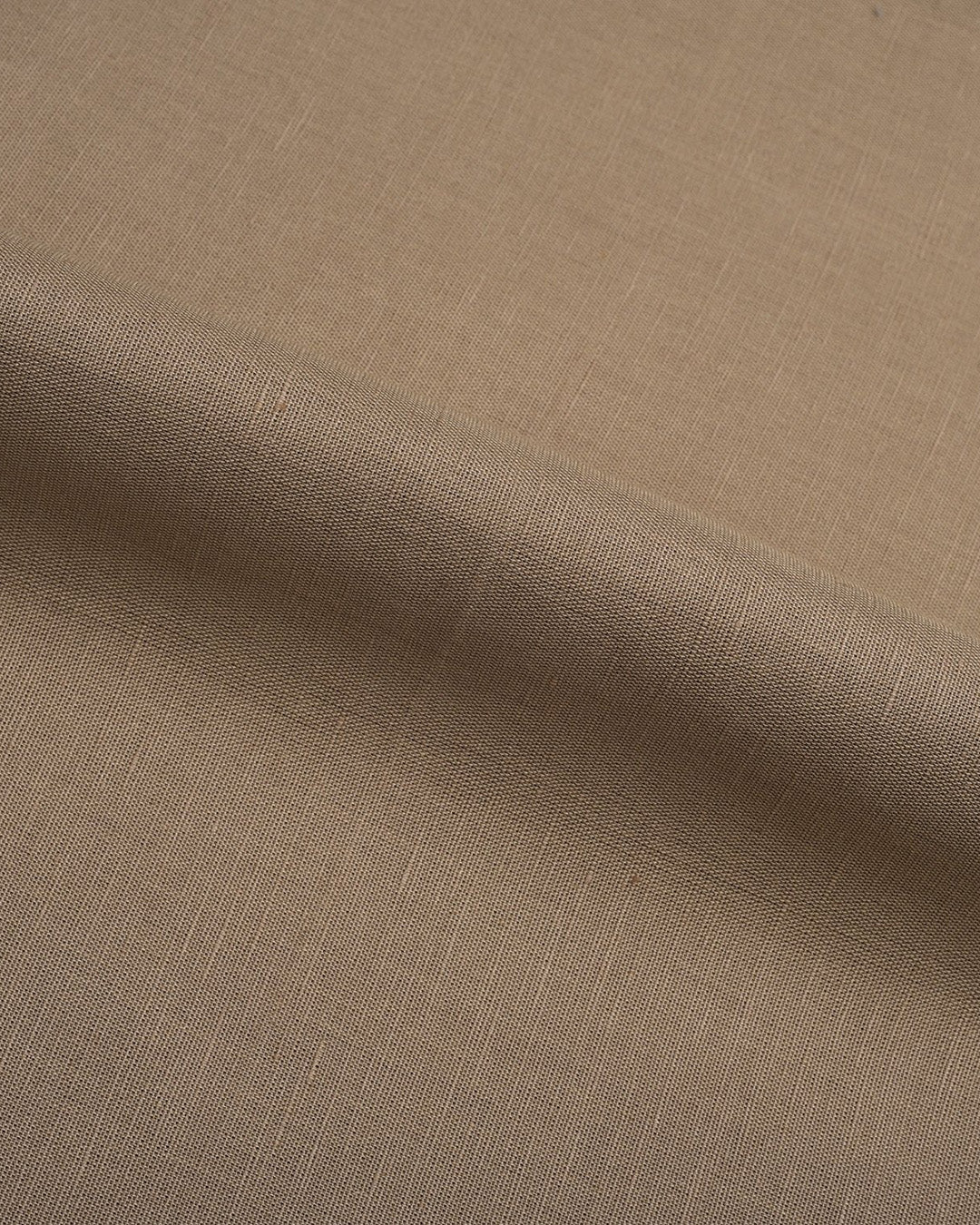 Close up of the custom linen shirt for men in light brown by Luxire Clothing
