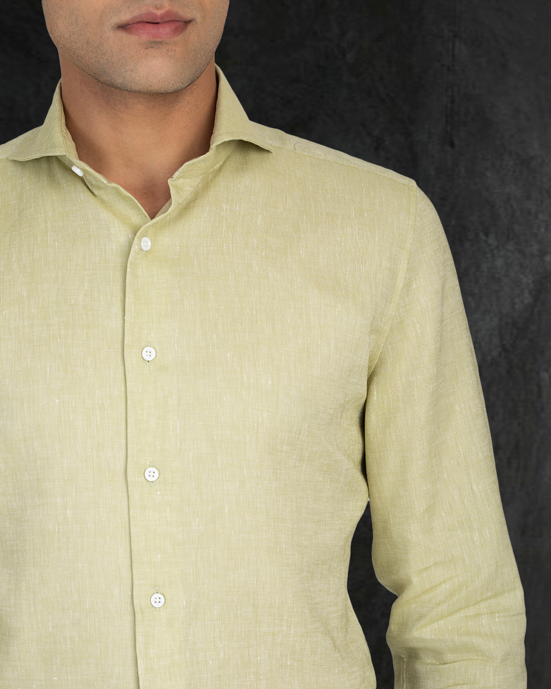 Model wearing the custom linen shirt for men in light olive green by Luxire Clothing 3