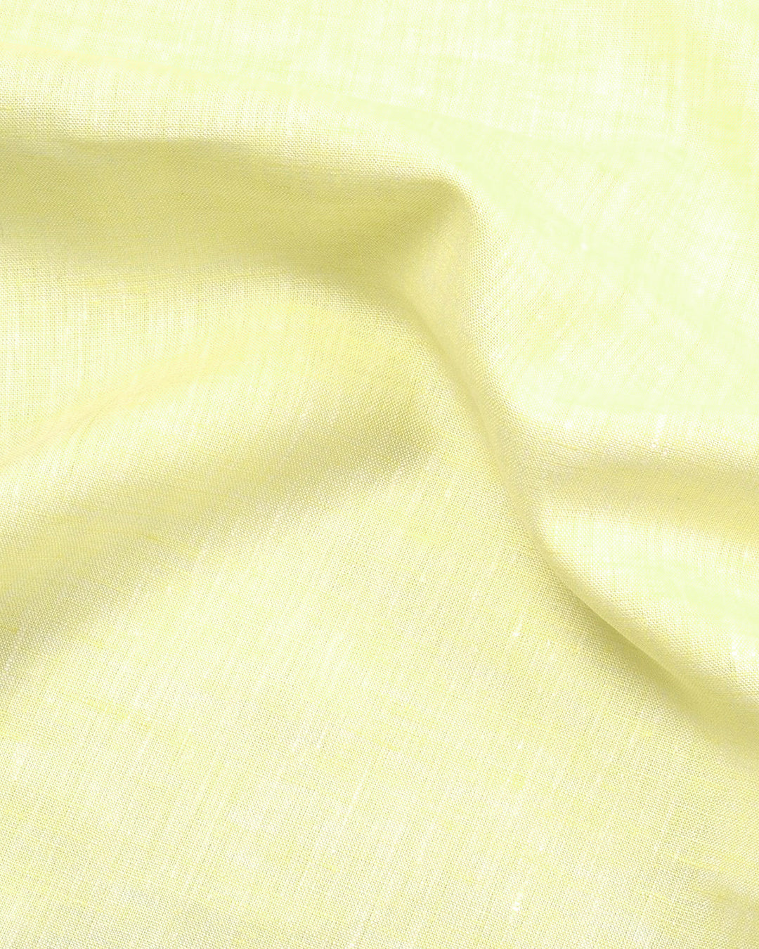 Close up of the custom linen shirt for men in pale yellow by Luxire Clothing 2